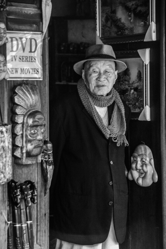 Portrait in a craft shop doorway